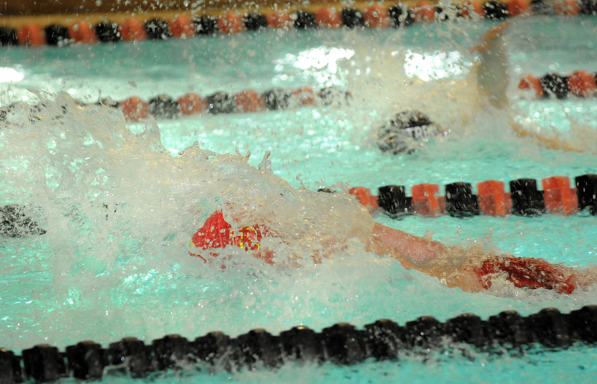 RI's Fleming advances to state in three events